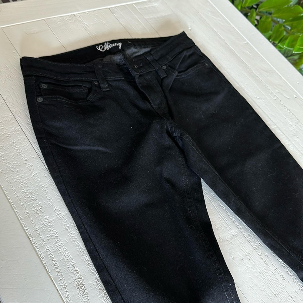 Tommy Hilfiger ultra low rise, skinny in the hip and thigh, slim leg opening sz4